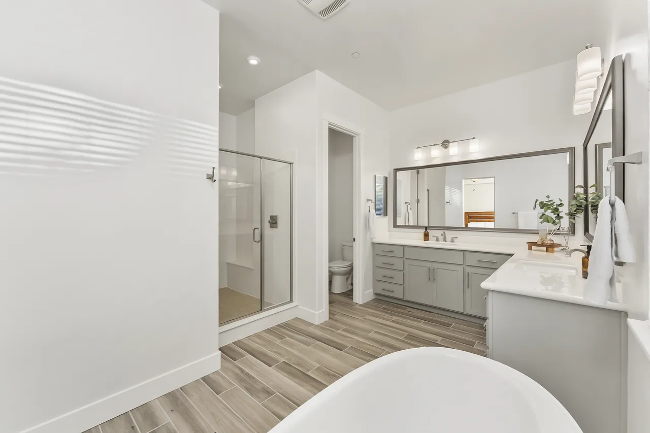 Primary bathroom with soaking tub and double vanity