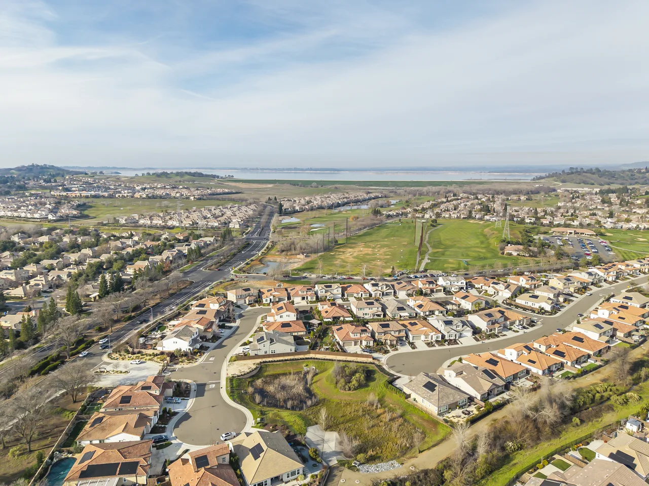 Aerial of Folsom community with reservoir on the horizon