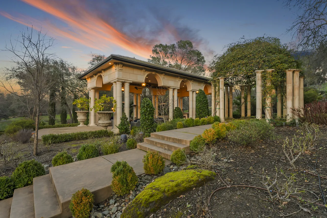 Stone columned pool house