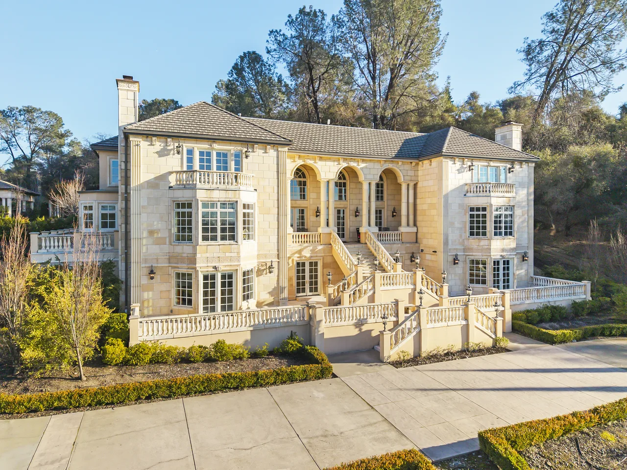 Italianate stone mansion with grand staircase